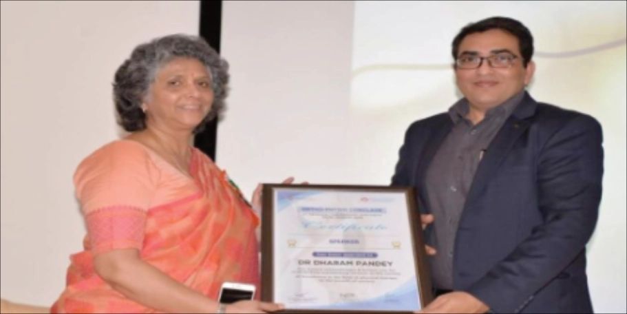 Receiving a commemorative plaque